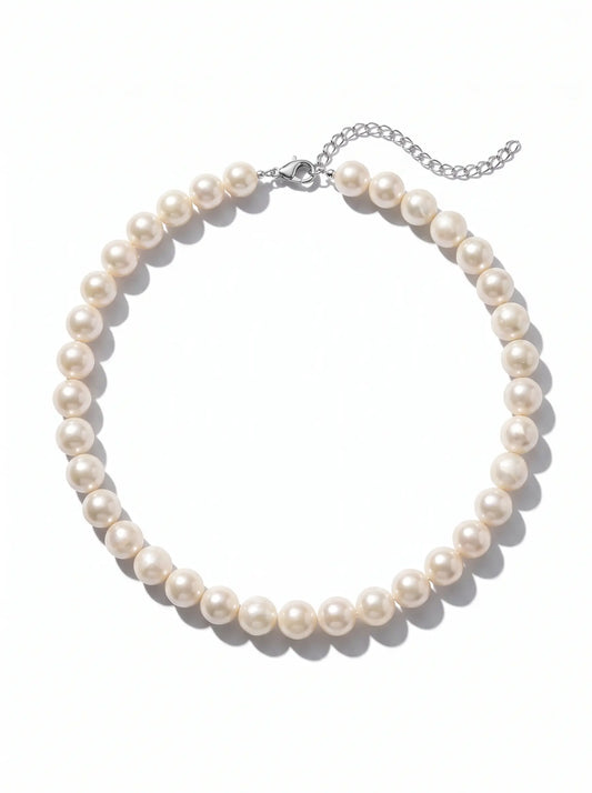 A classic pearl necklace with a silver-tone lobster clasp and extender chain, displayed on a clean white background.